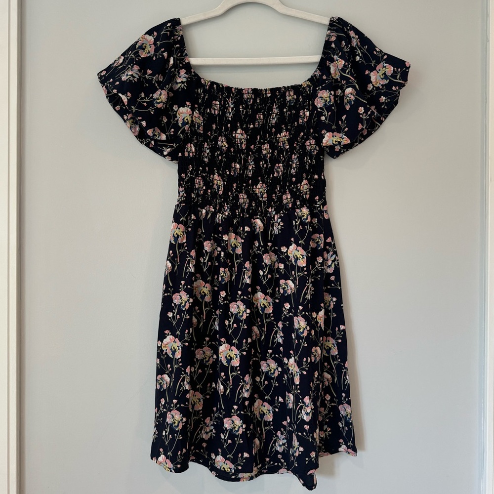 Cute Everly summer babydoll style dress with floral print.